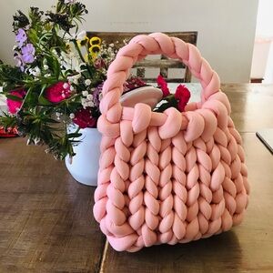 Bubblegum pink knit handbag